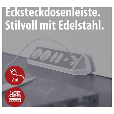Werbebild einer Edelstahl-Ecksteckdosenleiste mit angeschlossenem USB-Kabel; Text: 'Ecksteckdosenleiste. Stilvoll mit Edelstahl.' und Symbole für 2 m Kabellänge und USB-Charger.