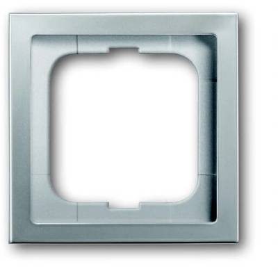 Ein silberner, quadratischer Rahmen für Steckdosen oder Schalter, schlichtes Design, glatte Oberfläche.
