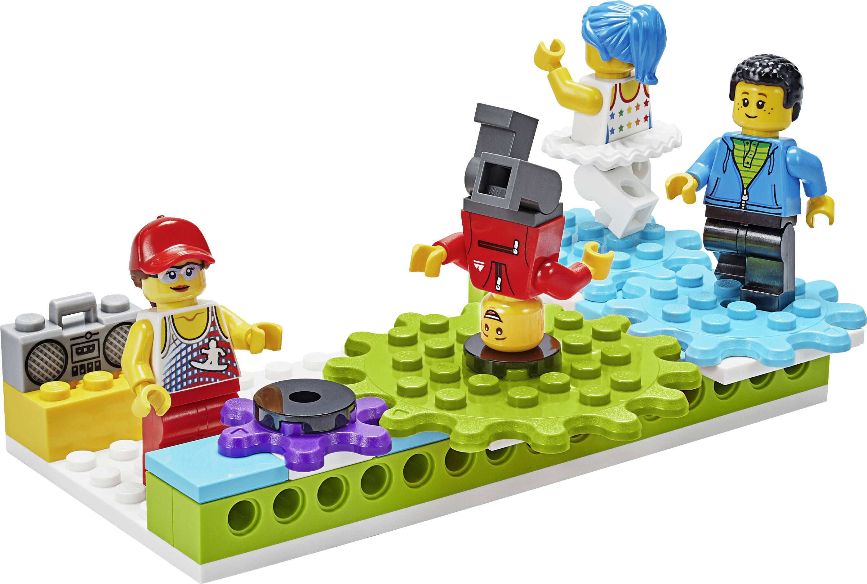 Zwei bunte Spielzeugfiguren stehen auf grünen Zahnrädern. Eine Figur tanzt auf dem Kopf, während die andere Musik hört.