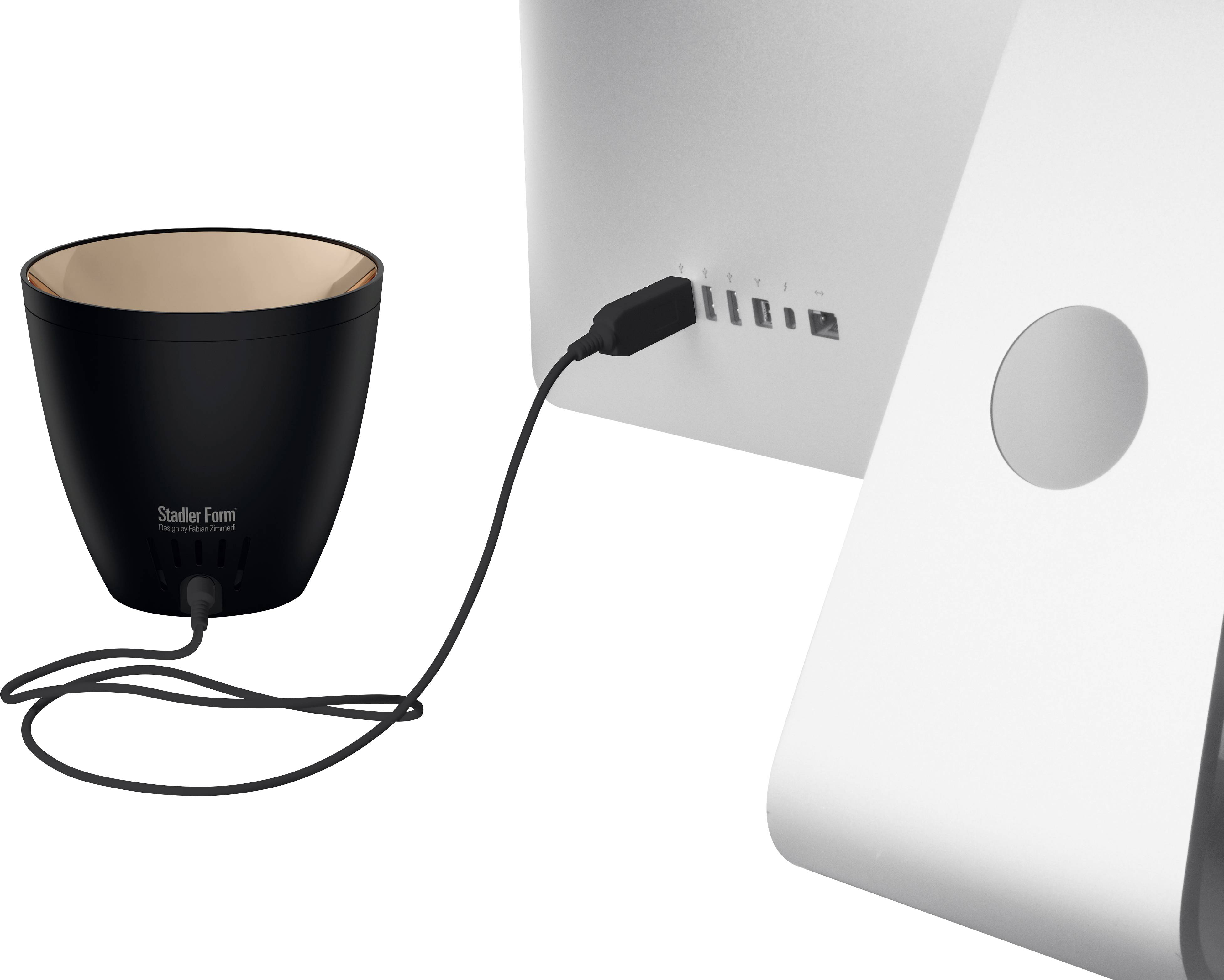 Ein schwarzer Blumentopf verbunden mit einem Computer, vermutlich zur Pflanzenüberwachung durch ein spezielles Kabelsystem.