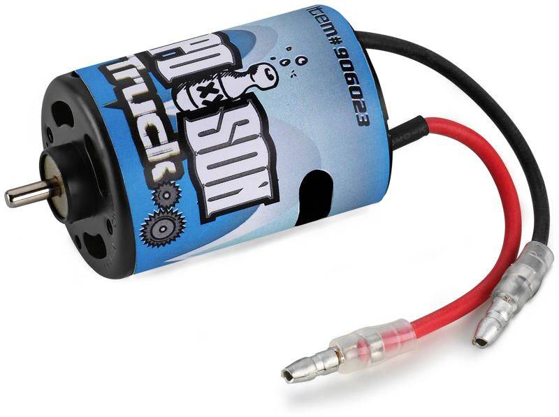 Ein elektrischer Motor mit blauer Zylinderhülle, schwarzen Endkappen und zwei Kabeln, einem roten und einem schwarzen, die verbunden sind.