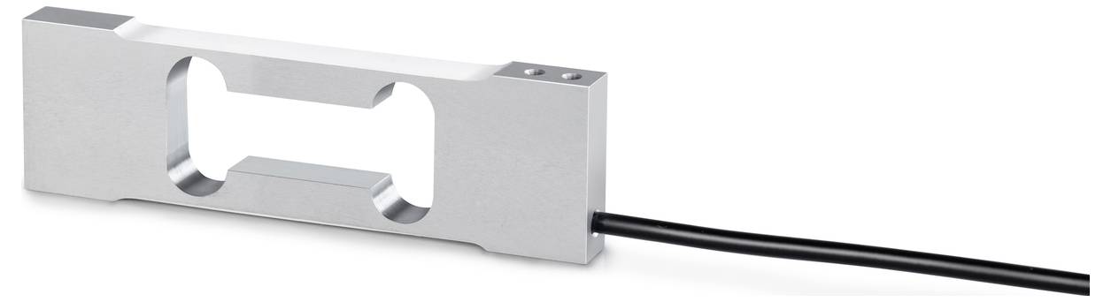 Ein rechteckiger, silberner Wägezellen-Sensor mit einer Öffnung in der Mitte und einem schwarzen Kabel, typischerweise für Gewichtsmessungen.