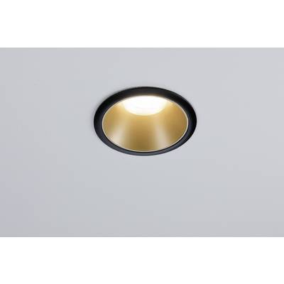 In die Decke eingelassene Leuchte mit goldenem Reflektor, die helles Licht abstrahlt.