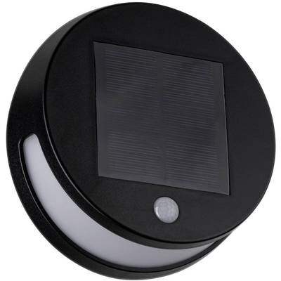 Schwarze Solarlampe mit rundem Design und integriertem Bewegungssensor. Oberseite trägt Solarpanel. Sicher für Außenbereich geeignet.