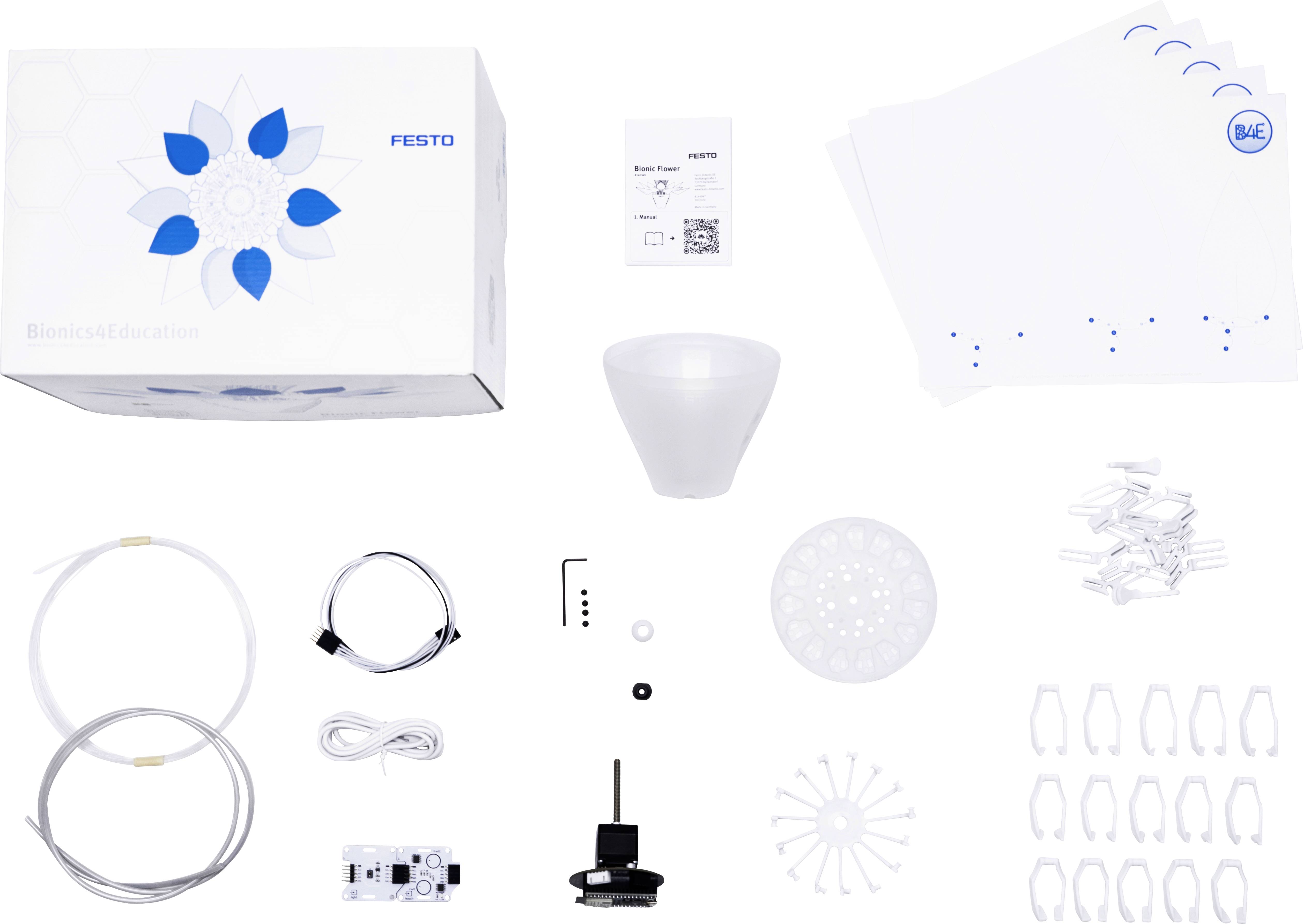 'Bionics4Education Kit' zeigt Komponenten wie Schläuche, Motor, Elektronik und Anleitungen. Eignet sich für Bildungszwecke im Bereich Bionik.