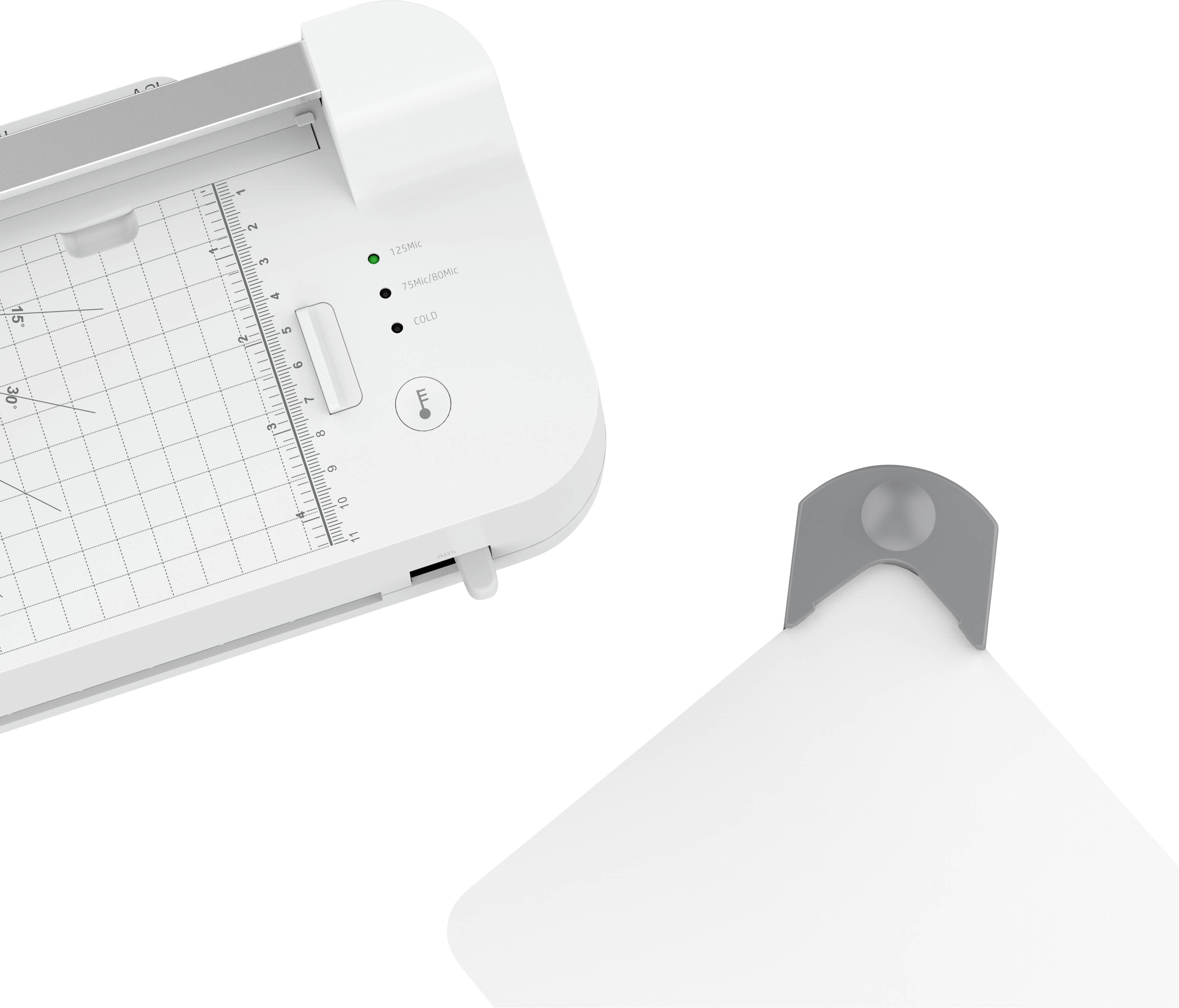 Ein weißes elektronisches Gerät mit Messlinien und Skala, neben einem grauen Objekt. Das Gerät hat Knöpfe und Leuchtanzeigen.