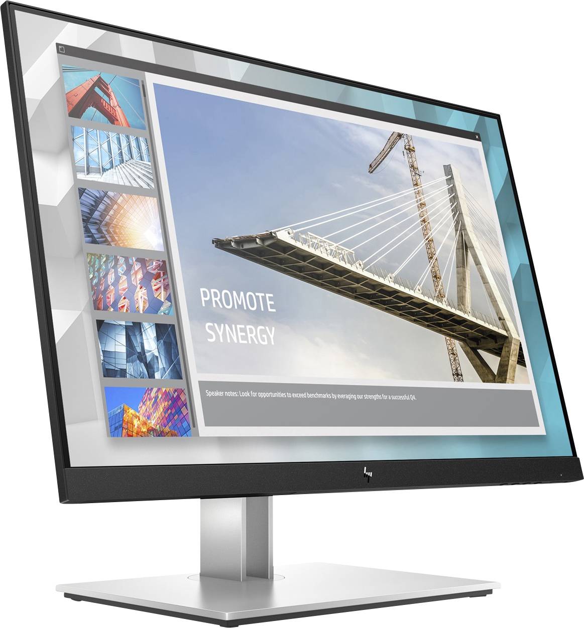 Ein Computermonitor zeigt eine Präsentationsfolie mit der Aufschrift 'Promote Synergy' und einem Bild einer modernen Brücke.
