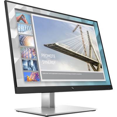 Ein Computermonitor zeigt eine Präsentationsfolie mit der Aufschrift 'Promote Synergy' und einem Bild einer modernen Brücke.