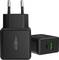Ein schwarzes USB-Ladegerät mit zwei Steckdosen, das sowohl Standard- als auch USB-C-Anschlüsse bietet.