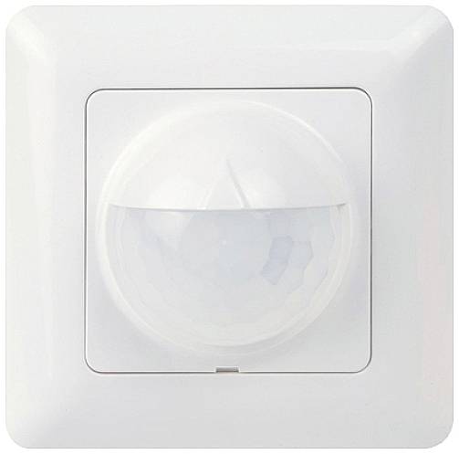Ein weißer Bewegungssensor an einer Wand, der zur automatischen Lichtsteuerung verwendet wird.