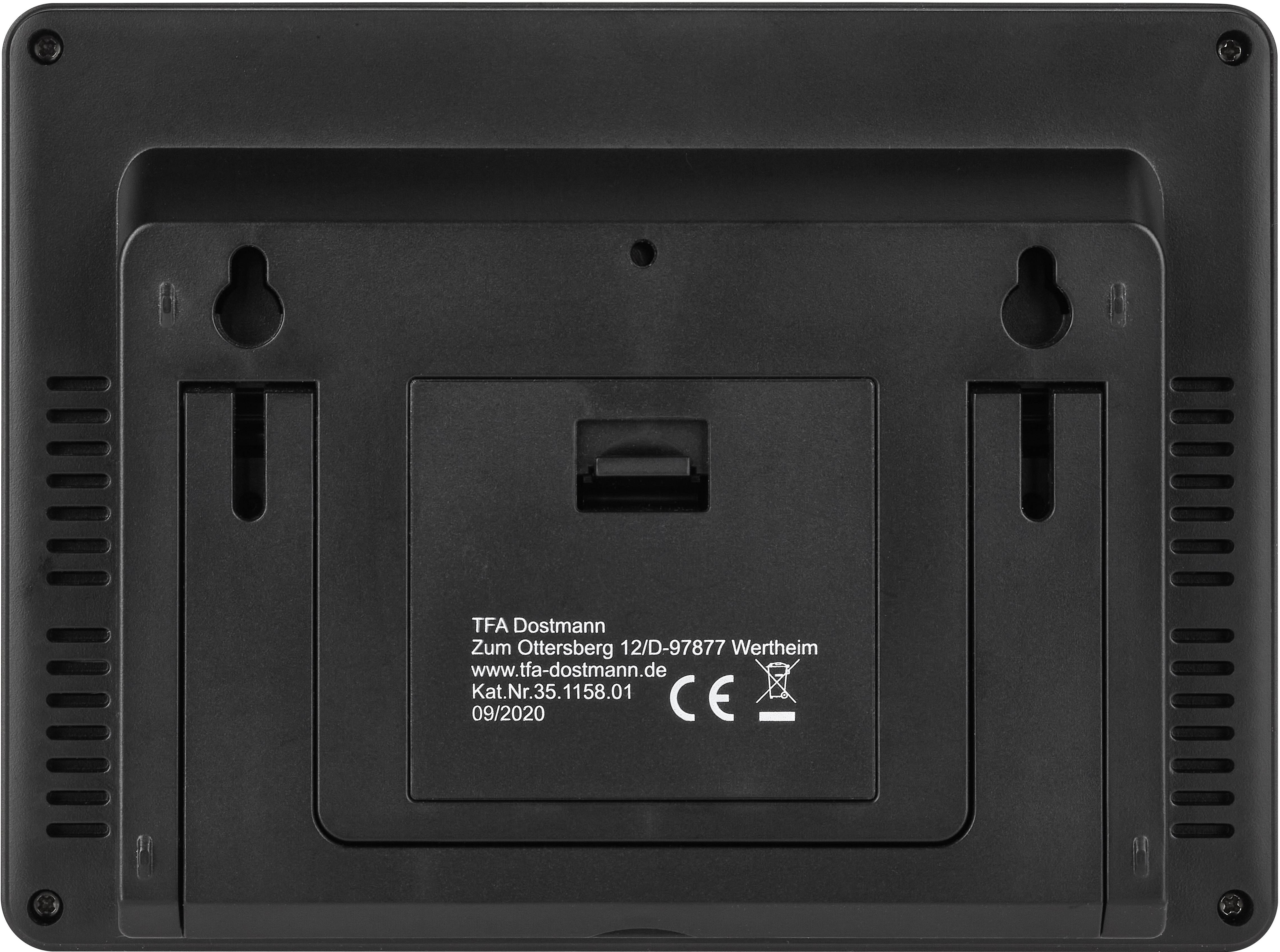 'Rückseite einer digitalen Uhr mit Standhalterung. Informationen zur Marke und Modellnummer sind unten aufgedruckt.'