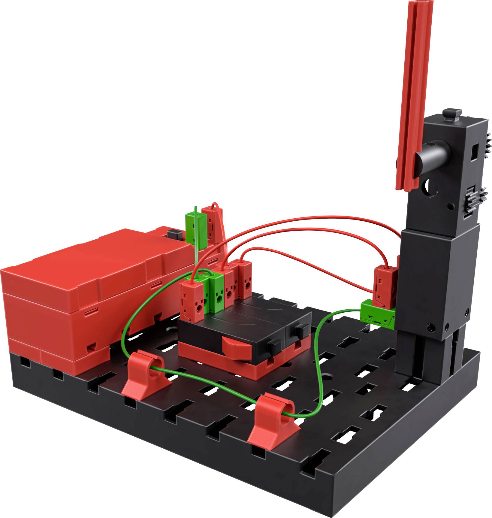 Kunststoffmodellbaukasten mit roten, grünen und schwarzen Komponenten auf einer Basisplatte. Drahtverbindungen zeigen elektrischen Schaltkreis.