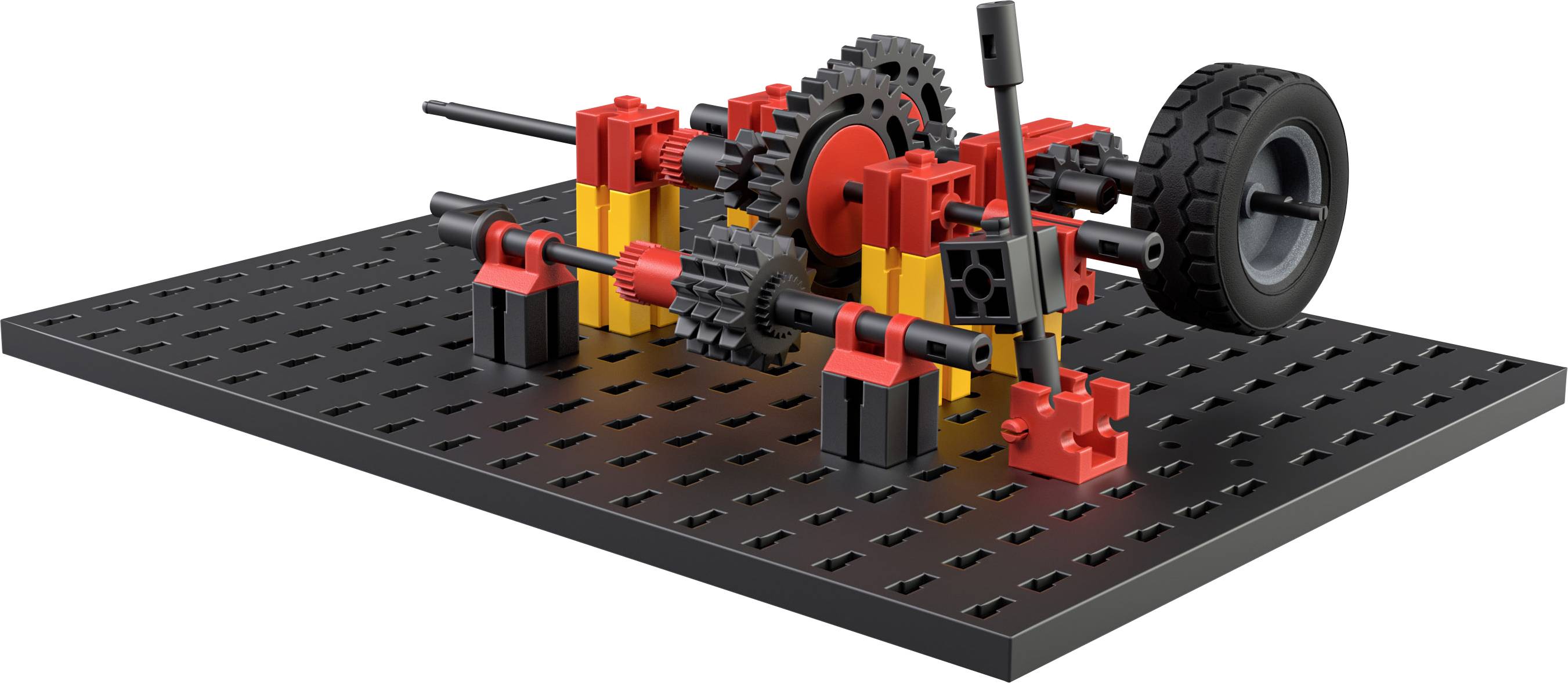 Ein Modell aus Klemmbausteinen zeigt ein Zahnradgetriebe mit Hebel und Rad auf einer schwarzen Platte.