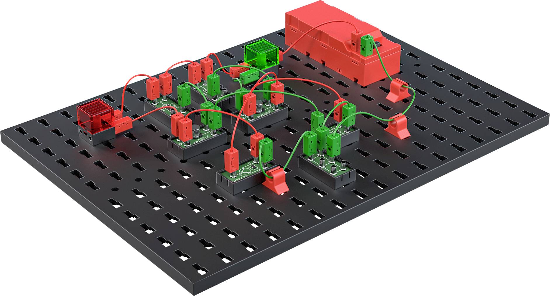 Eine schwarze Platte mit roten und grünen elektrischen Verbindungen und einem roten Kasten; zeigt eine einfache Schaltung oder ein Experimentierbrett.
