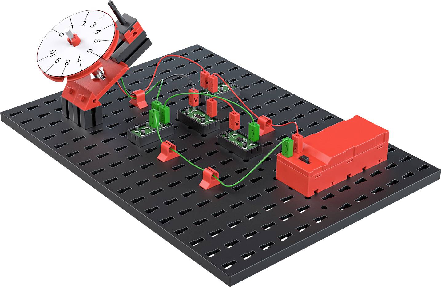 Elektronisches Experimentierbrett mit Schaltkreis, roten und grünen Komponenten und Kabeln auf schwarzer Platte.