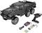 Ferngesteuerter, sechsrädriger, schwarzer Offroad-Truck mit Zubehör: Fernsteuerung, Ladegerät, Batteriepacks und Kabel.