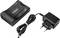 'Schwarzer SCART Adapter und Netzstecker mit Kabel. Verbindet alte Videoausrüstung mit modernen Geräten.'