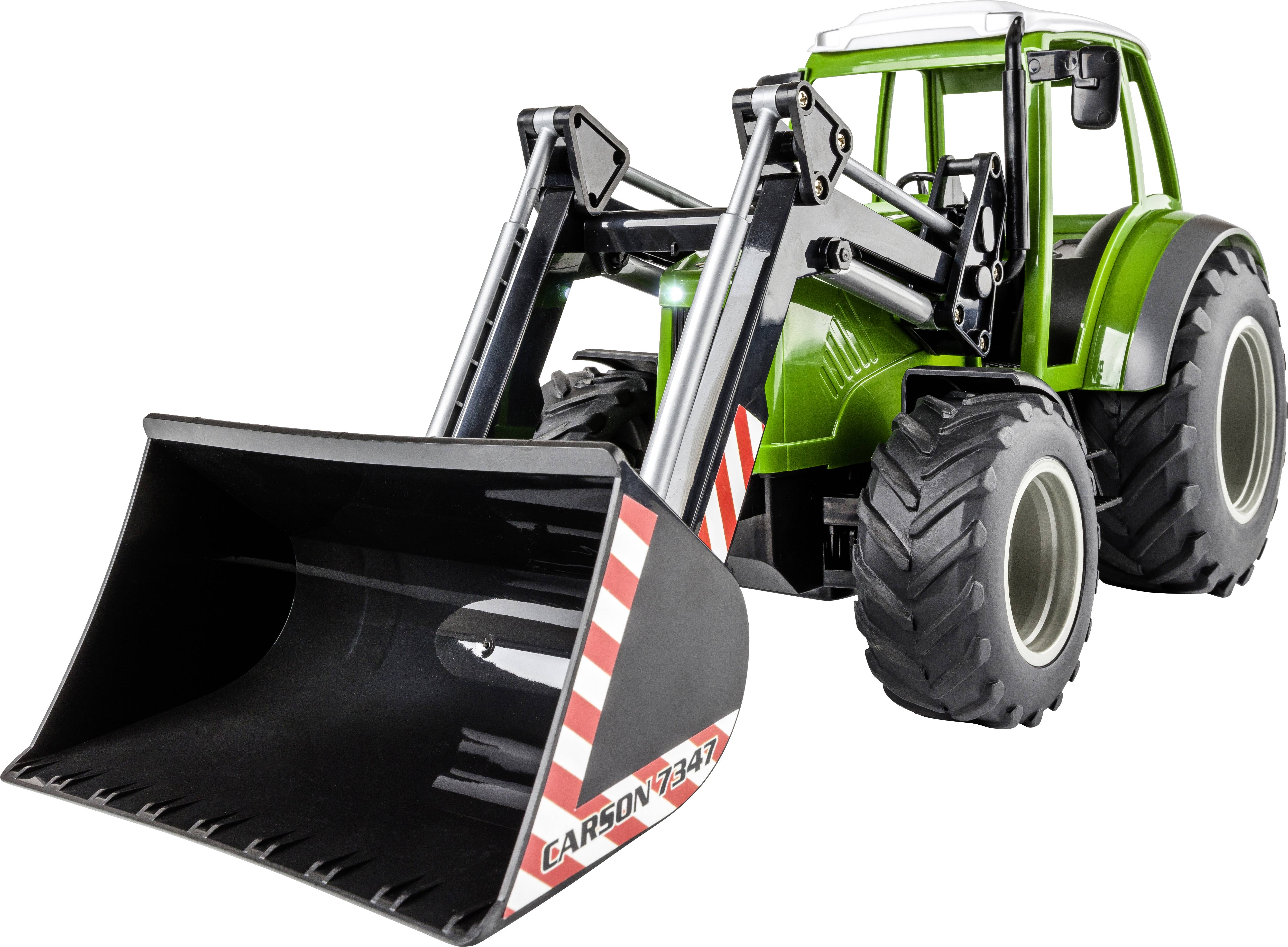 Ein grüner Spielzeugtraktor mit großer Frontschaufel, geeignet für Kinder ab 3 Jahren.