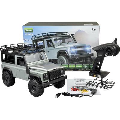 Spielzeug-Geländewagen-Set mit Fernsteuerung und Zubehör für Kinder ab 8 Jahren. Verpackung zeigt Abbildung des Wagens in der Natur.