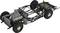 Das Bild zeigt ein Auto-Chassis mit sichtbarem Motor, Fahrwerk und Auspuffsystem. Es fehlen Karosserie und Innenraum.