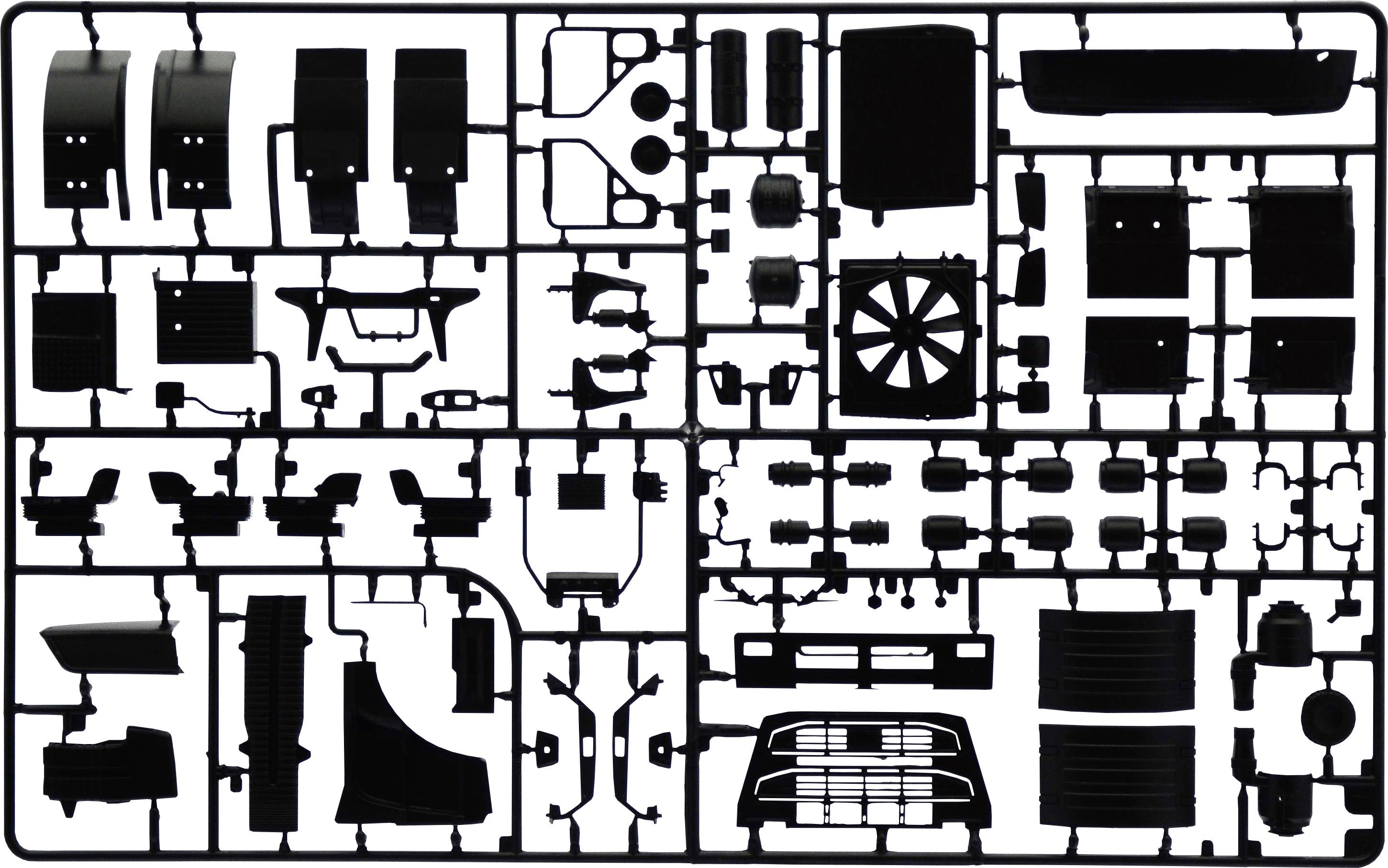 Gussrahmen mit verschiedenen schwarzen Plastikteilen eines Modellbausatzes. Teile sind für die Montage eines Mini-Modellfahrzeugs.