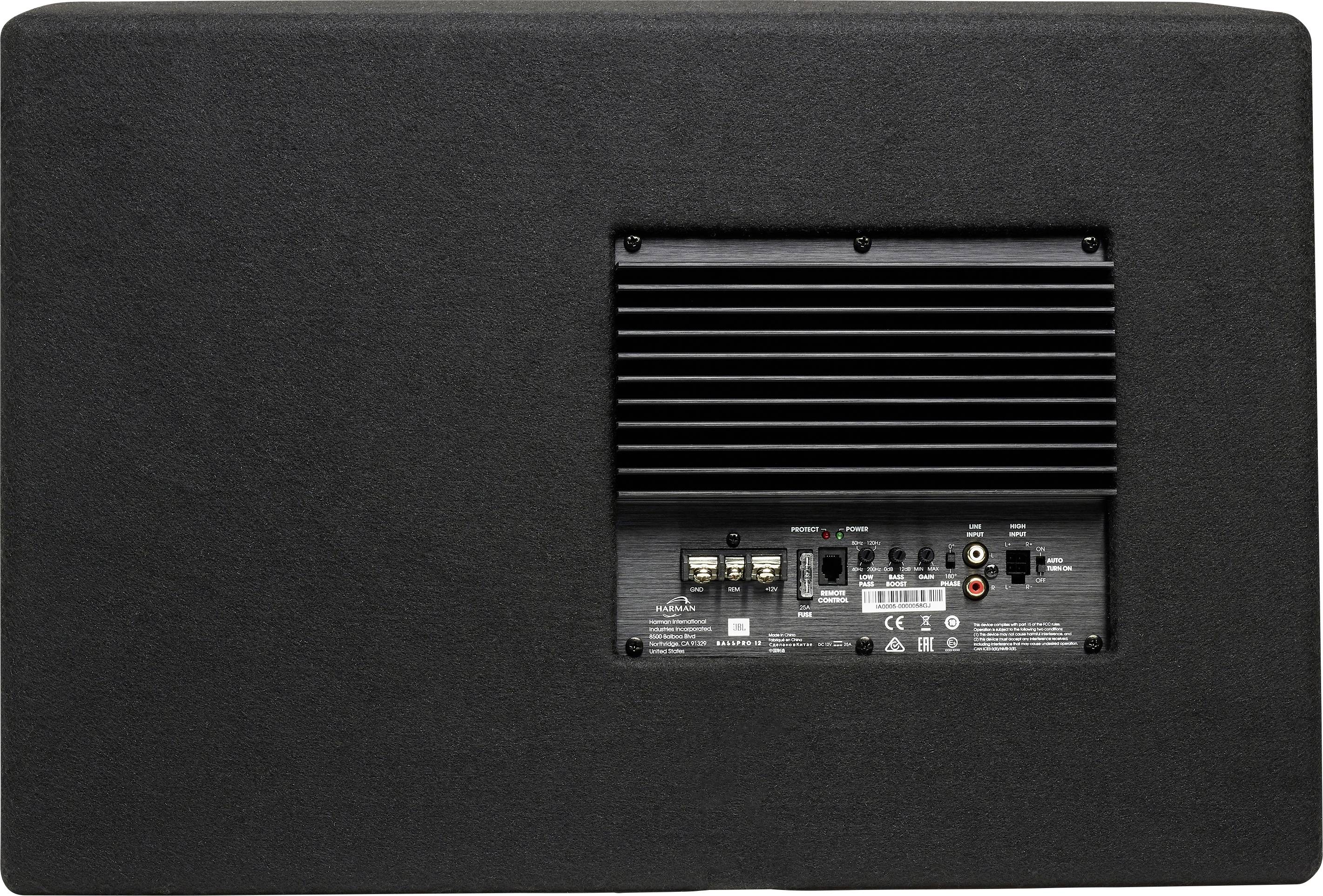 Rückseite eines Subwoofers mit Anschlüssen und Bedienfeld. Enthält Eingangs- und Ausgangsanschlüsse sowie Bedienelemente für Audioeinstellungen.