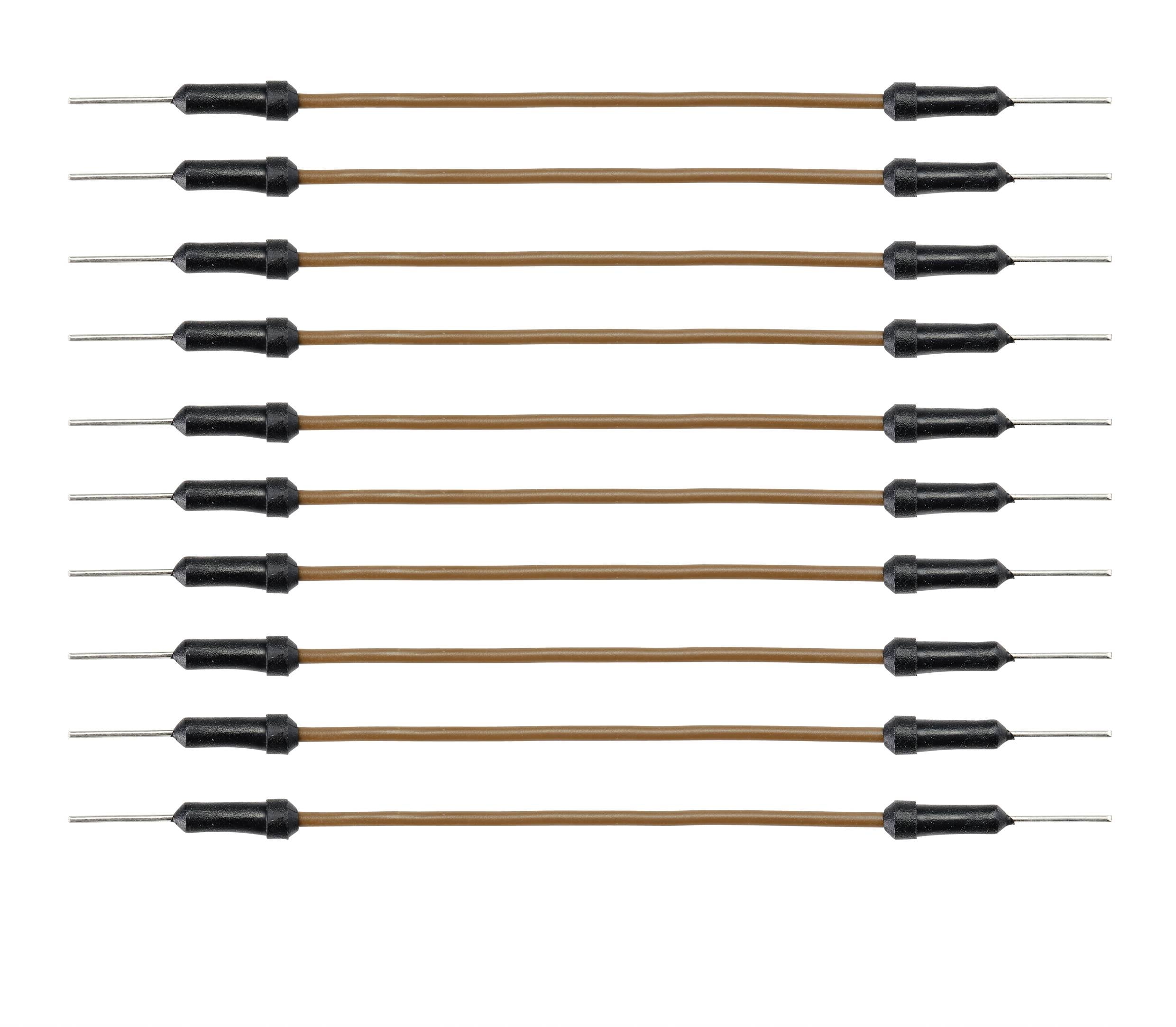 Dreizehn identische elektrische Widerstände in einer Reihe angeordnet. Jeder hat zwei Anschlüsse aus Metall und einen schwarzen Mittelteil.