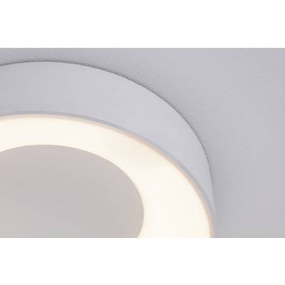 Eine runde, moderne Deckenleuchte strahlt sanftes, warmes Licht aus und ist an einer grauen Decke montiert.