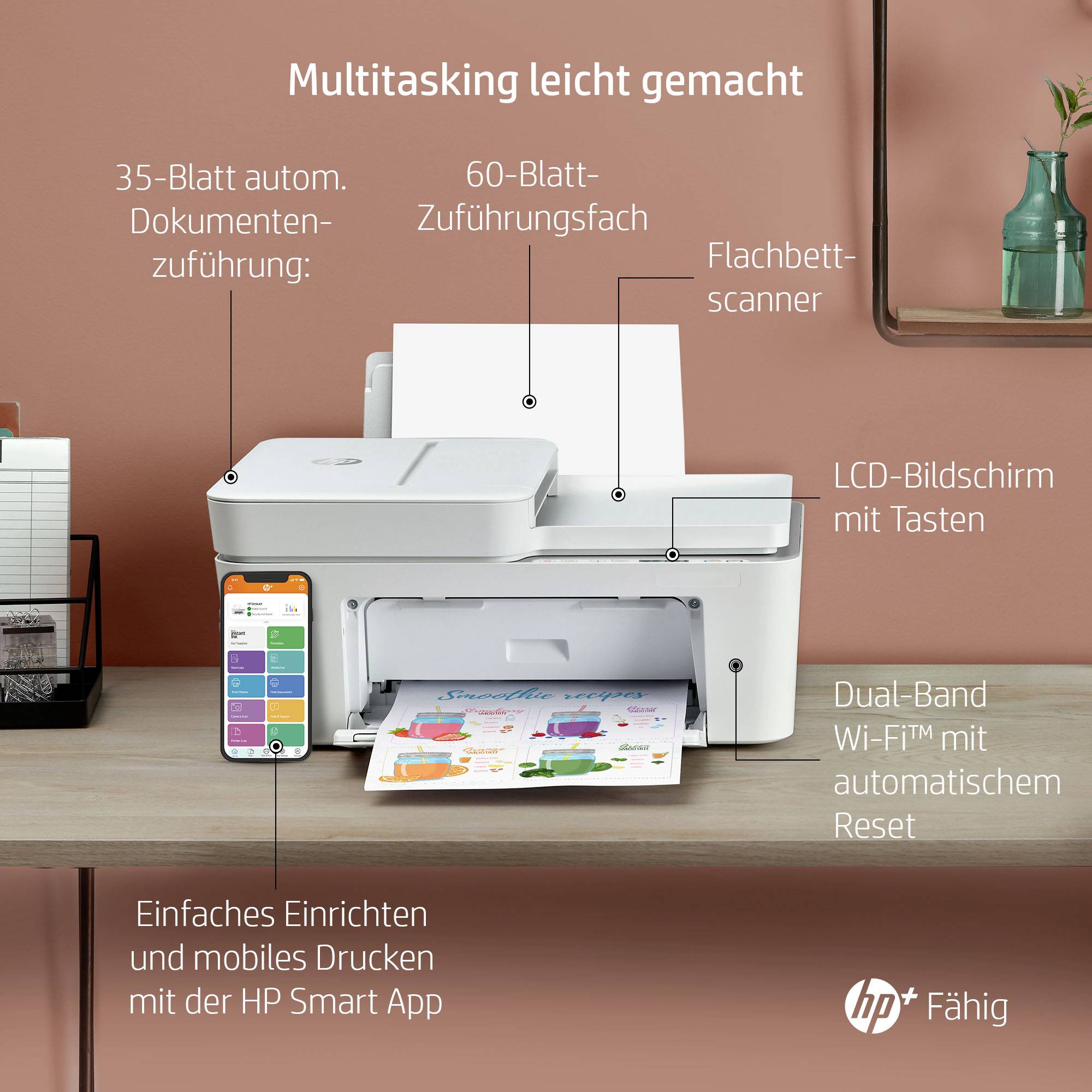 Multifunktionsdrucker auf einem Tisch mit Handy. Funktionen: 35-Blatt-Dokumentenzufuhr, WLAN, LCD-Bildschirm, Schnellstart.