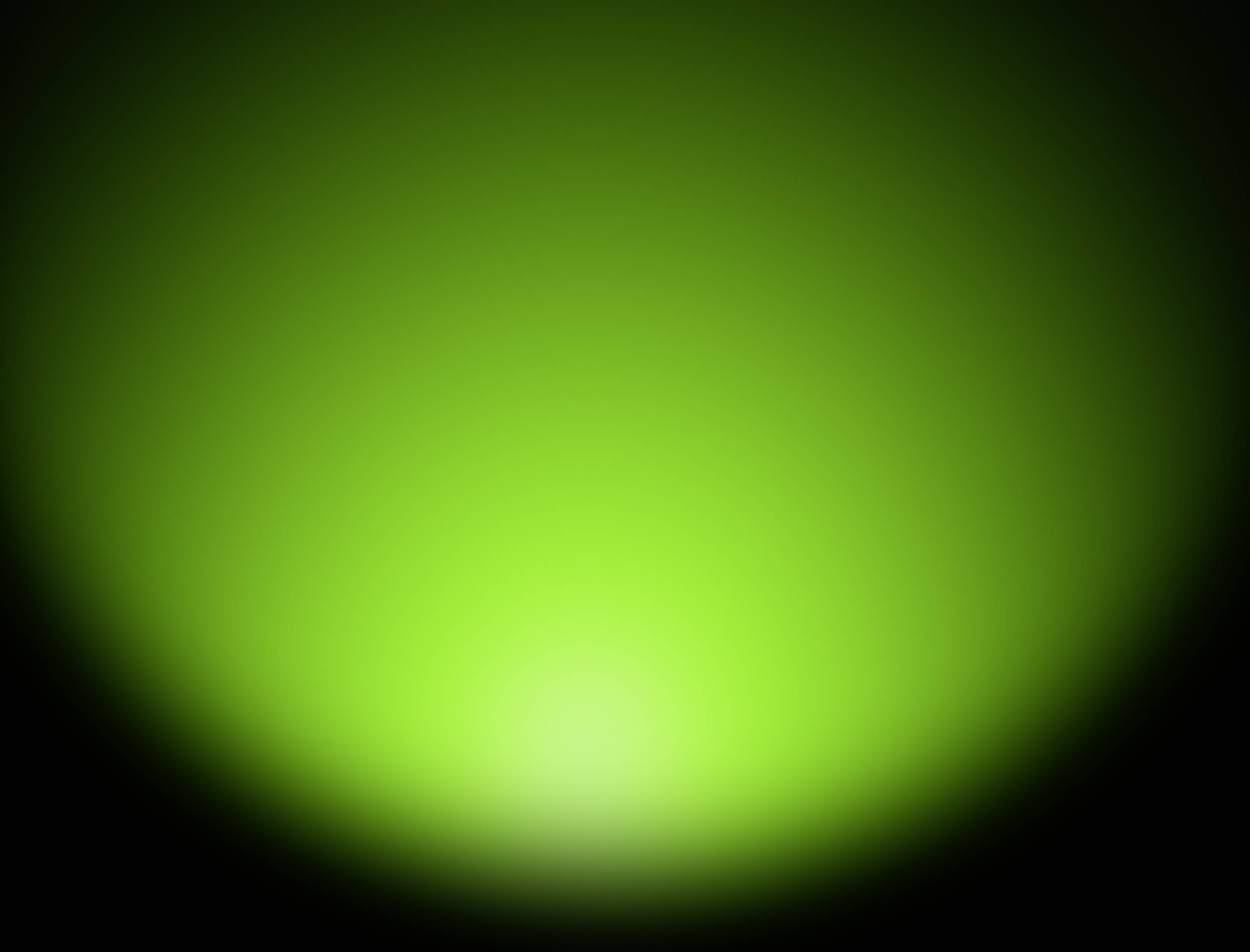 Ein sanftes grünes Leuchten, das sich nach außen hin in Schwarz verfärbt, vermittelt ein beruhigendes und geheimnisvolles Gefühl.