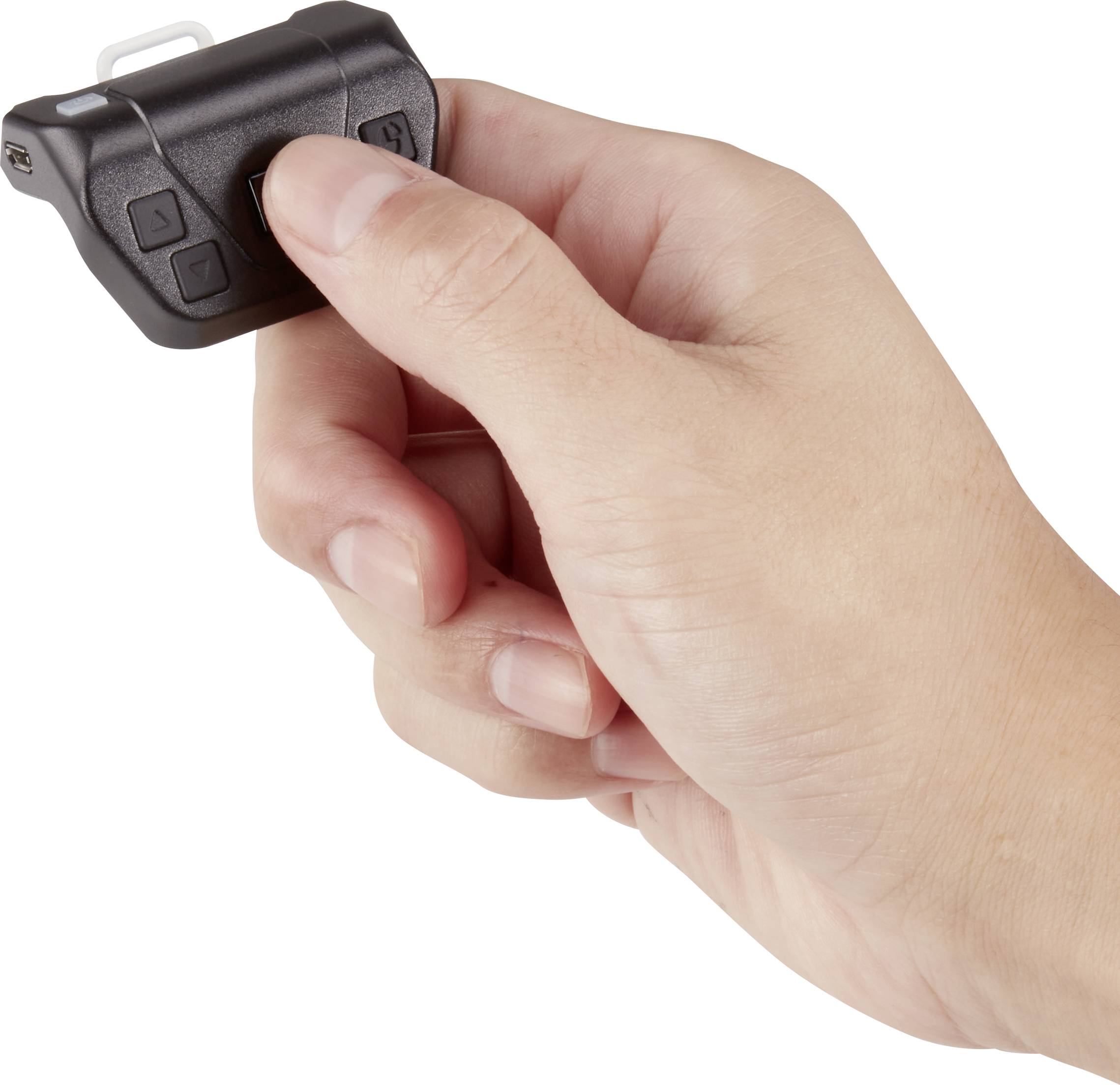 Hand hält eine kleine schwarze Fernbedienung mit mehreren Knöpfen, vermutlich zur Steuerung eines elektronischen Geräts.