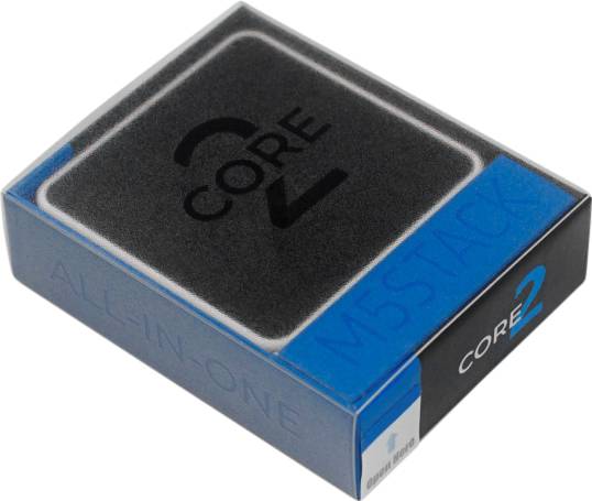 Eine Verpackung des M5Stack Core2, ein All-in-One Entwicklungsboard für IoT-Projekte, in einer blauen und grauen Box.