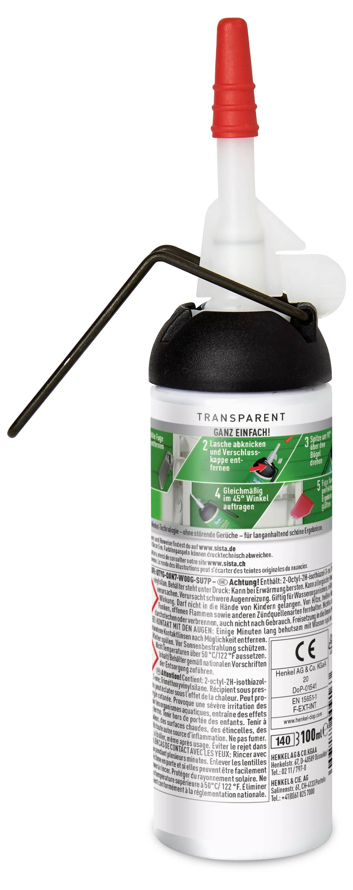 Eine Flasche mit Schnellauslauf-Öler, roter Verschluss, grünes Etikett mit Anwendungshinweisen, Text in verschiedenen Sprachen.