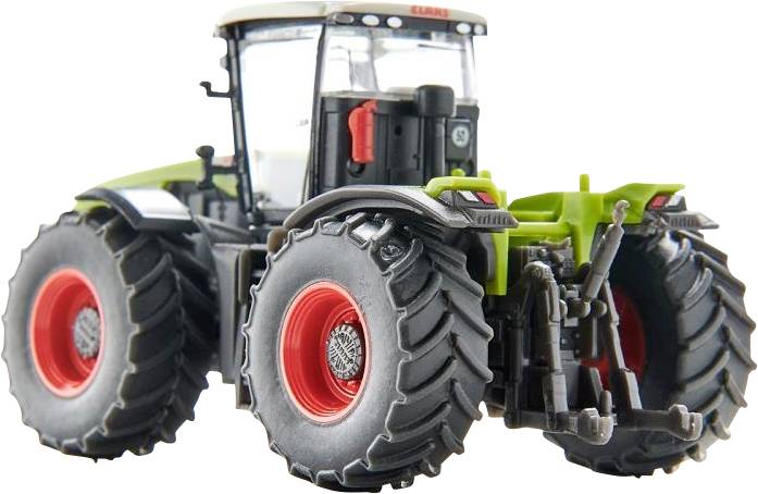 Ein Modelltraktor mit großen, roten Rädern und grünem Chassis zeigt landwirtschaftliche Maschinen im Detail.