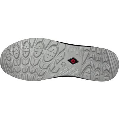 Die Laufsohle eines Schuhs mit rutschfestem Profil, unterschiedlichen Texturen für Grip und Flexibilität, sowie einem roten Logo in der Mitte.
