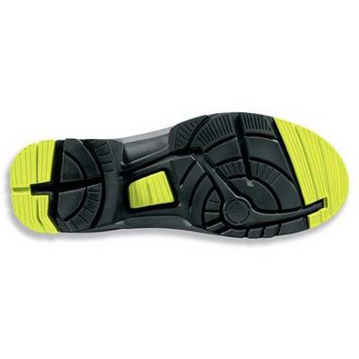 Schuhsohle mit schwarzem Profil und gelben Gummieinsätzen für bessere Rutschfestigkeit und Dämpfung.