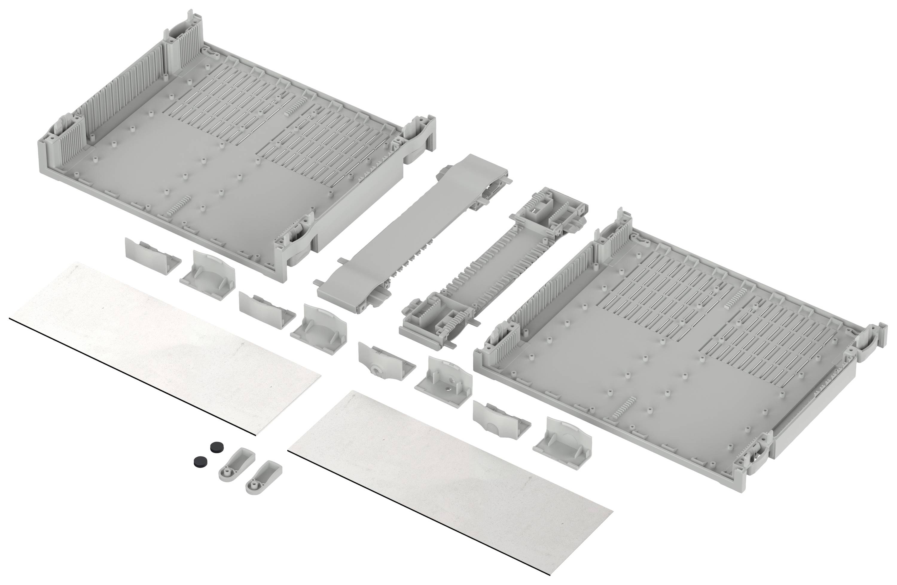 Abbildung eines geöffneten Gehäusebausatzes mit mehreren Komponenten, darunter zwei große Platten, Verbinder und kleinere Teile.