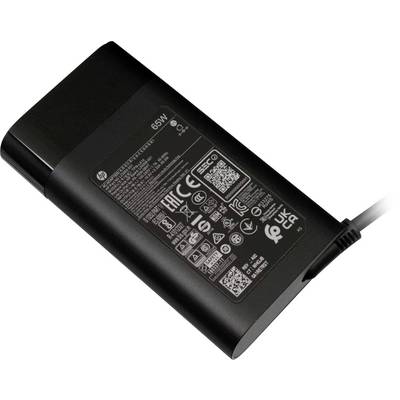 Schwarzes Laptop-Netzteil mit Aufschrift '65W', verschiedenen Prüfzeichen und Symbolen, Kabelanschluss an der rechten Seite.