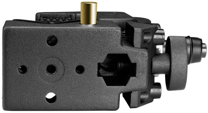 Schwarzes mechanisches Bauteil mit zylinderförmigem Messingelement und Löchern. Möglicherweise Teil einer größeren Maschine.