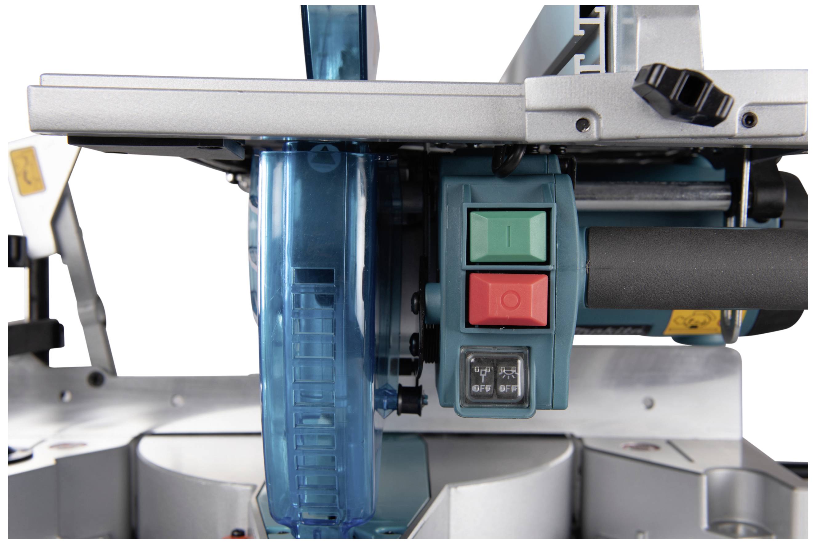 Elektrische Säge mit blauen und grauen Komponenten sowie rot-grünen Schaltern. Hauptteil zeigt Klingenabdeckung und Steuerknöpfe.