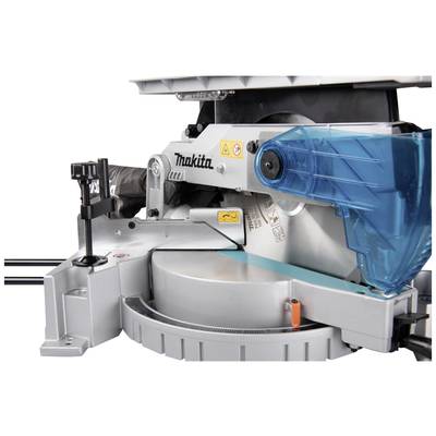 Ein blauer Winkelschleifer auf einem Tisch. Die Maschine hat Sicherheitskennzeichnungen und einen blauen Schutz.