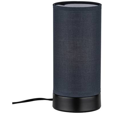 Eine schwarze Tischlampe mit zylindrischem Lampenschirm steht auf einem Tisch. Ein Stromkabel ist auf der linken Seite sichtbar.