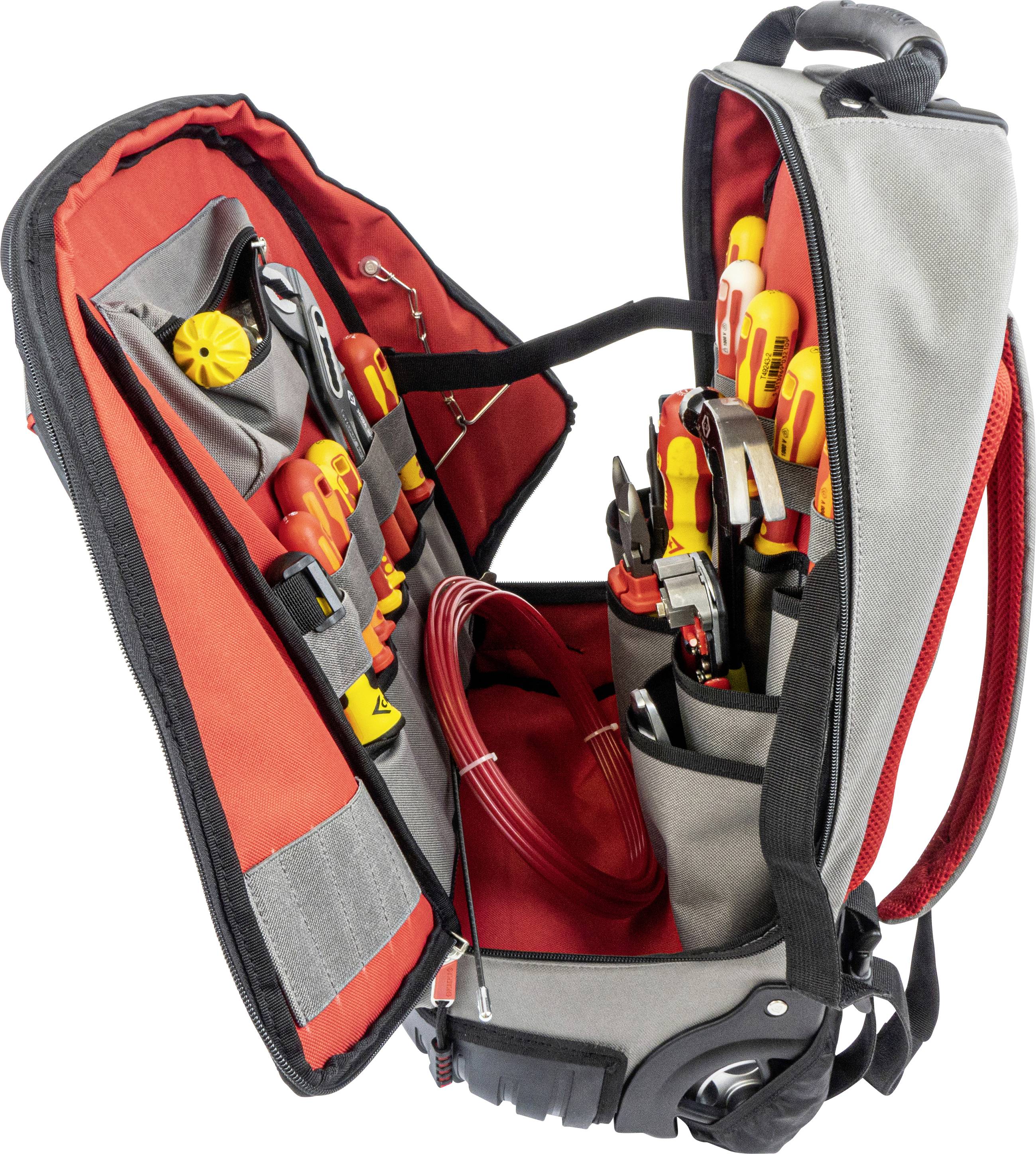 Geöffneter Werkzeugrucksack mit mehreren Schraubendrehern, Zangen und Kabeln, zeigt eine organisierte Sammlung von Handwerkzeugen.