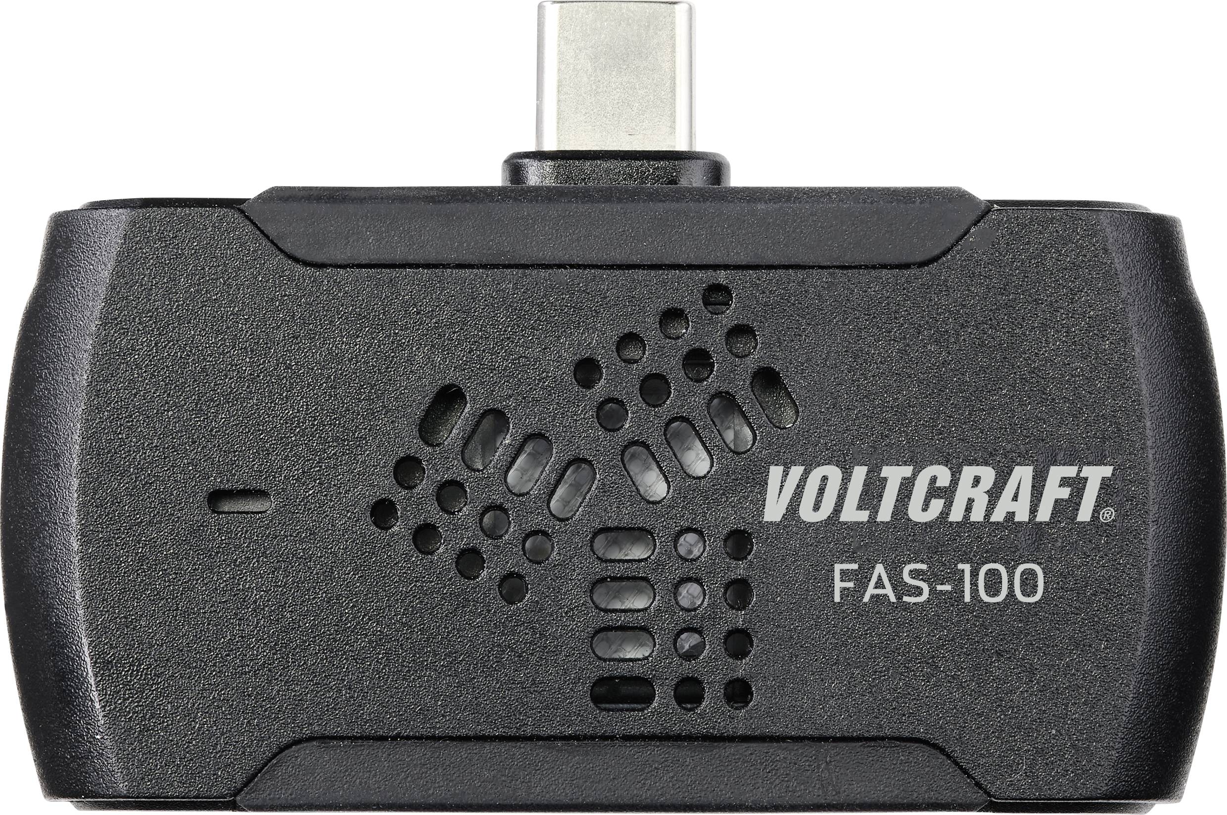 'Voltcraft FAS-100, ein kompakter USB-C-Stecker mit Lüftungsschlitzen. Dient vermutlich zur Messung oder Analyse von Daten.'