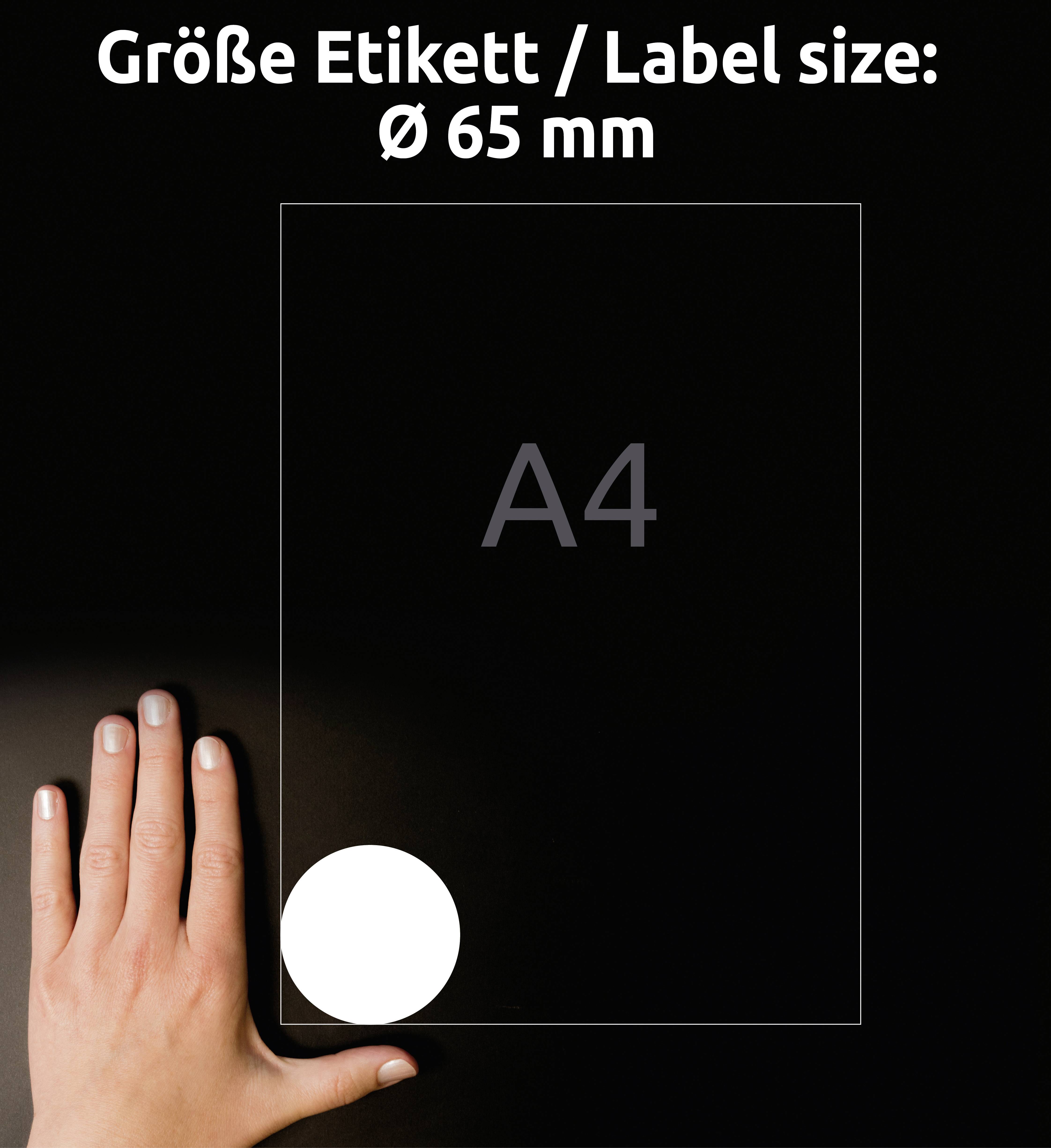 'Eine Hand zeigt auf ein A4-Blatt mit einem Kreis von 65 mm Durchmesser in weißer Farbe. Text: Größe Etikett / Label size: Ø 65 mm.'