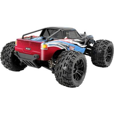 Ein ferngesteuertes Auto mit großen, grobstolligen Reifen und buntem Design in Rot, Blau und Schwarz, fotografiert von hinten.