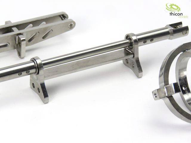 Metallische Maschinenteile auf weißem Hintergrund, ein Lager und zwei Stangen sind sichtbar, mit thicon models Logo oben rechts.