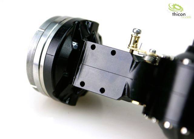 Nahaufnahme eines mechanischen Teils mit runden und rechteckigen Elementen, möglicherweise Teil eines Modells oder industriellen Geräts.
