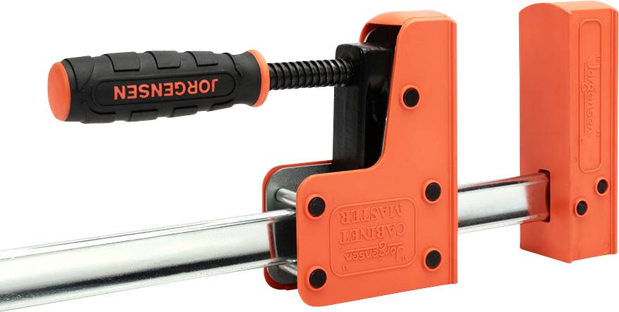 Eine orange und schwarze Schraubzwinge der Marke 'Jorgensen' mit einer Metallstange und Griff, verwendet zum Spannen und Halten von Werkstücken.