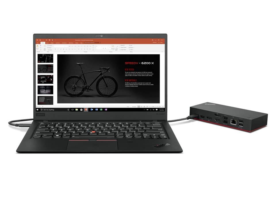 Ein geöffneter Laptop mit einer Präsentation über das Fahrradmodell 'SpeedX - 6200 X', daneben eine angeschlossene Dockingstation.